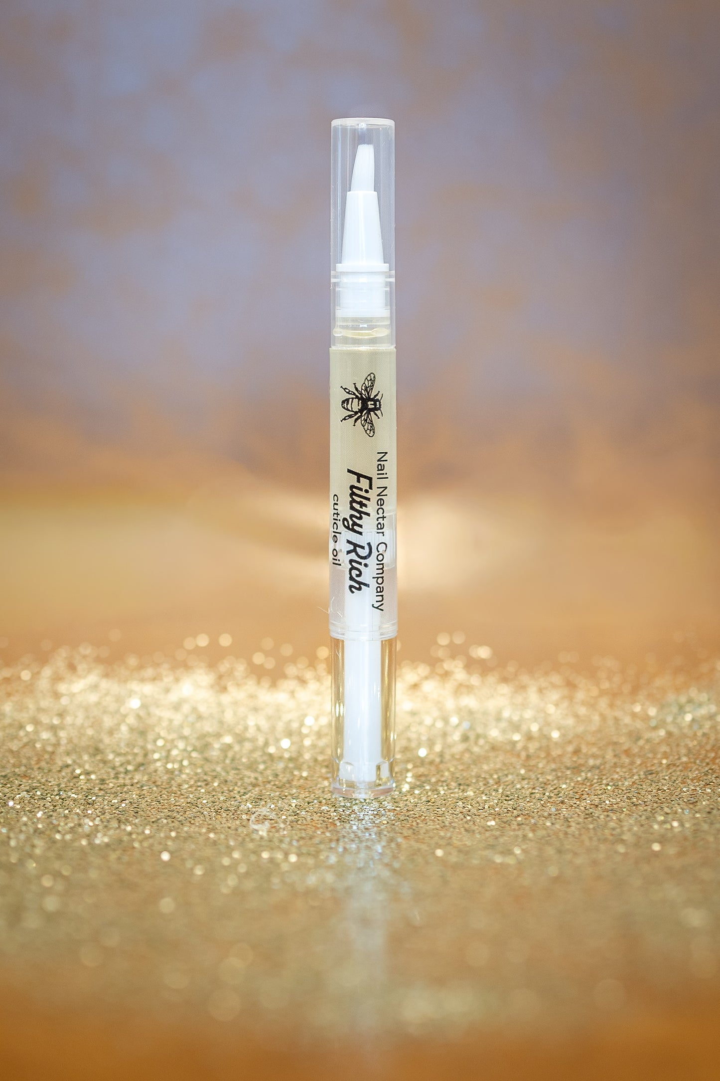 Cuticle oil pen, Nail nectar company, Filthy rich, birchwood oud, vanilla sugar, coffee cake